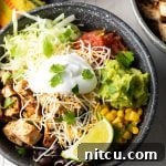 A finished Chipotle Chicken Burrito Bowl, vibrant and ready to eat.
