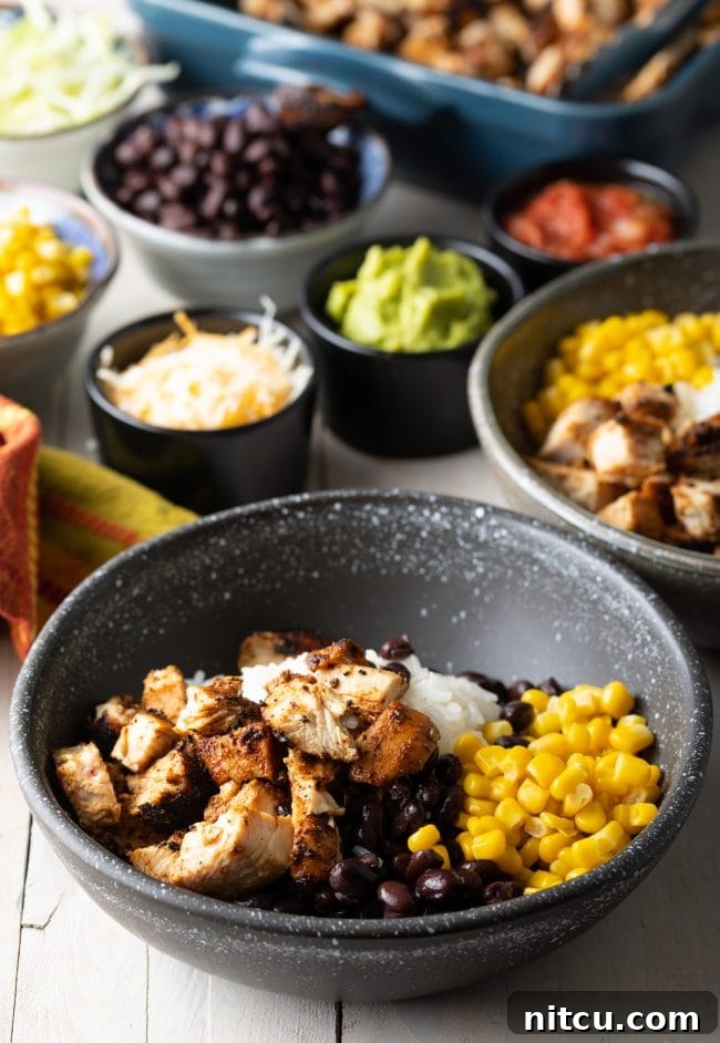 Step-by-step image showing how to layer ingredients into a burrito bowl, starting with rice and chicken.