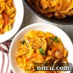 Pappardelle pasta with seafood sauce in a bowl, ready to be served