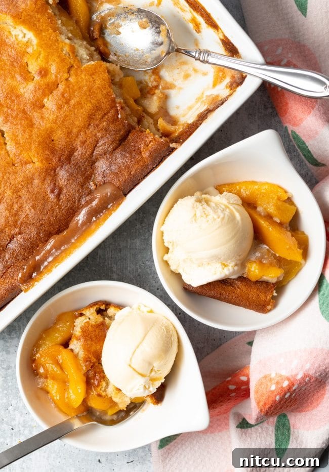 bisquick peach cobbler with scoops of ice cream