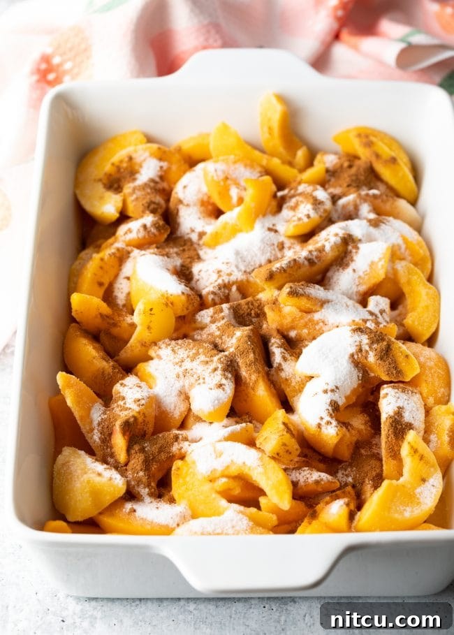 sliced peach covered with sugar and spices