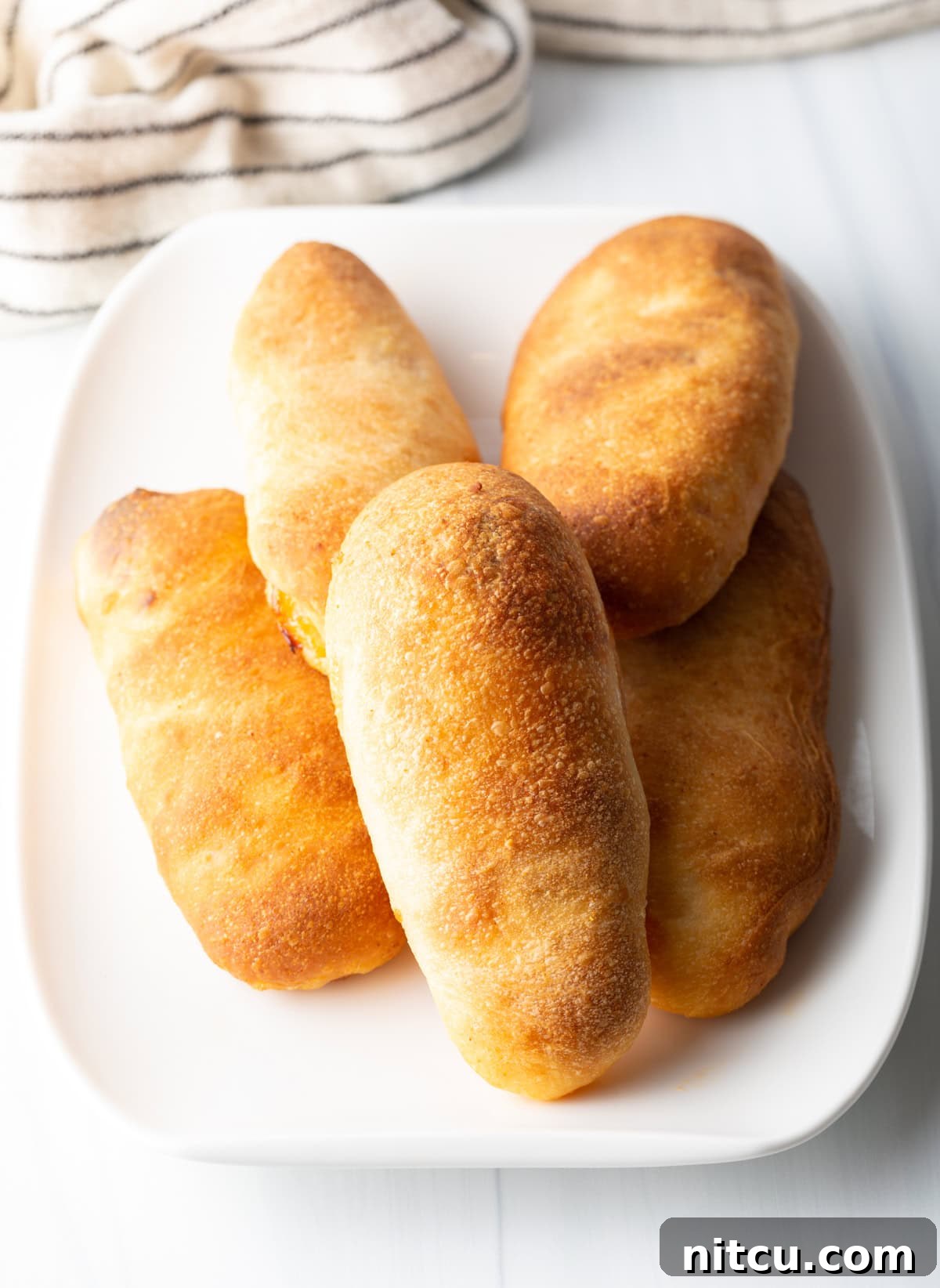 platter of homemade pepperoni rolls freshly baked