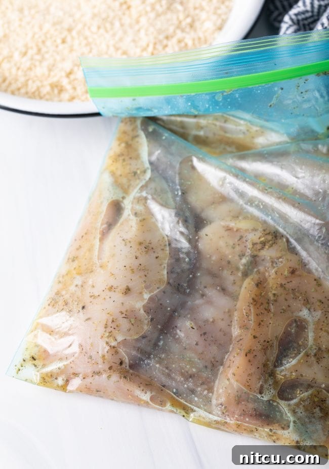 raw thin cut breasts in Italian marinade