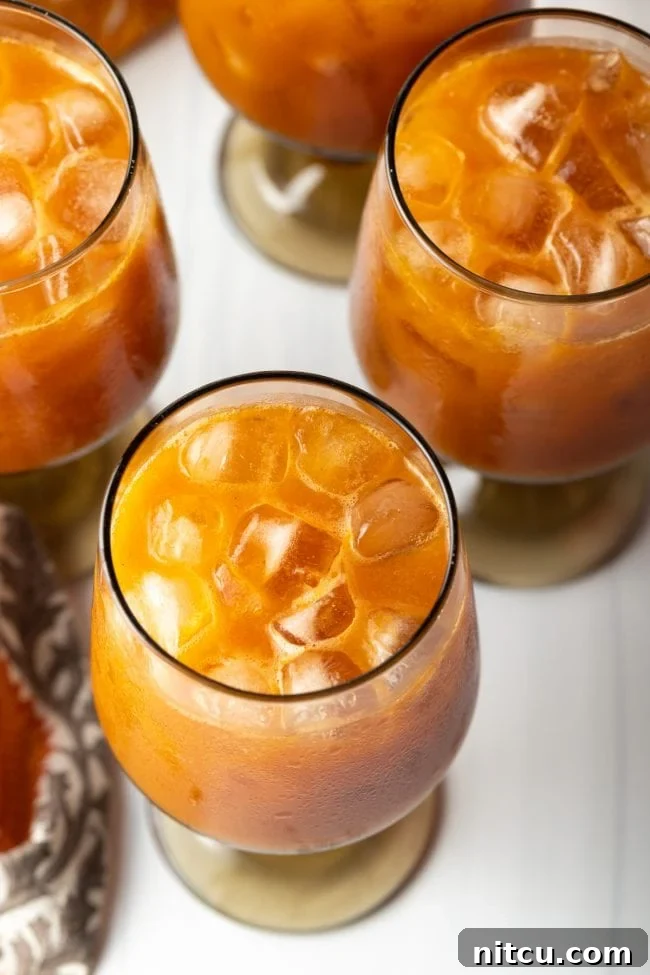top view of iced harry potter pumpkin juice in 3 glasses