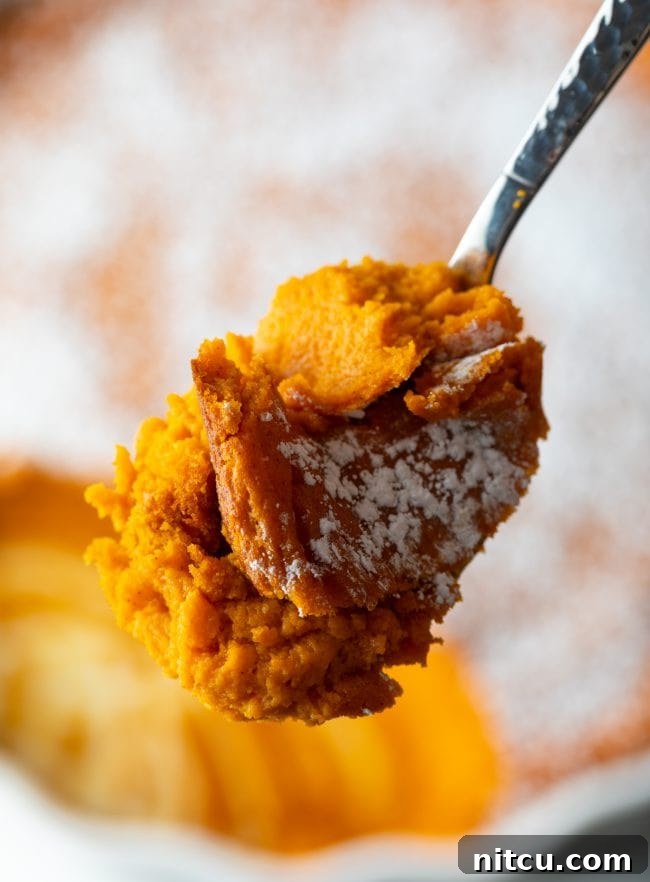 close view of spoon with mashed carrot casserole recipe