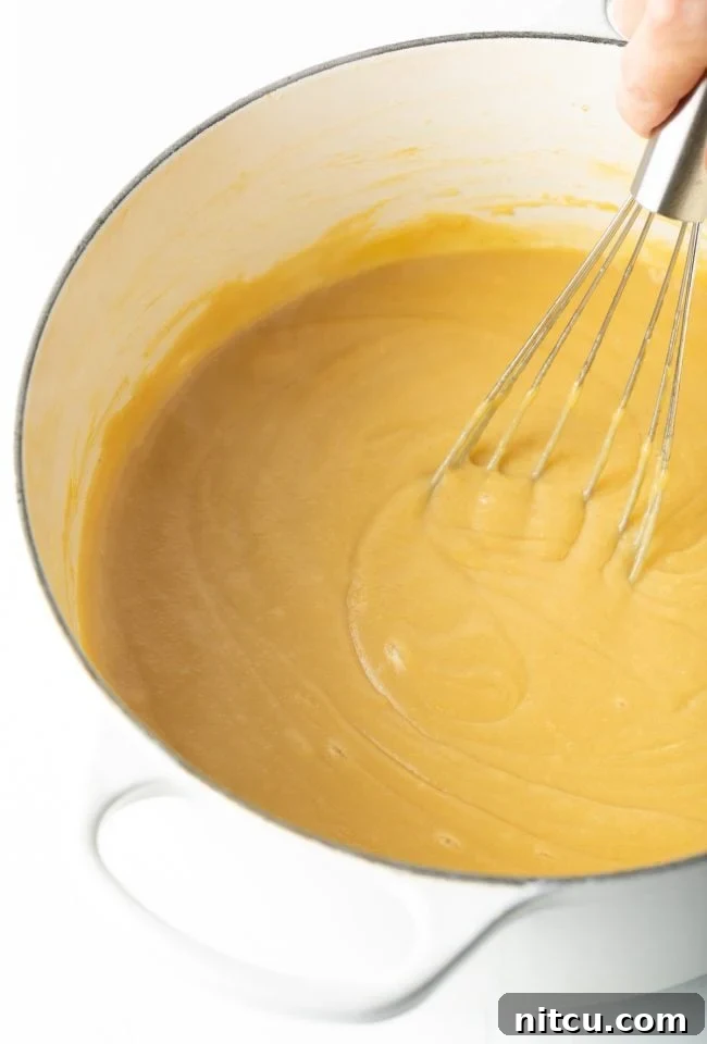 whisking as the mixture thickens