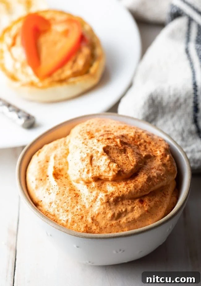 No-Cook Red Pepper dip served in a small bowl. 
