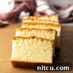 A baked Japanese Castella Cake, ready to be sliced.