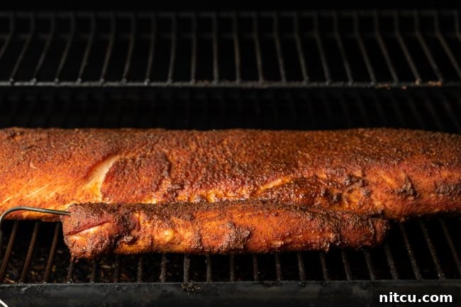 loin and tenderloin in a smoker with Smoked Pork Loin Rub