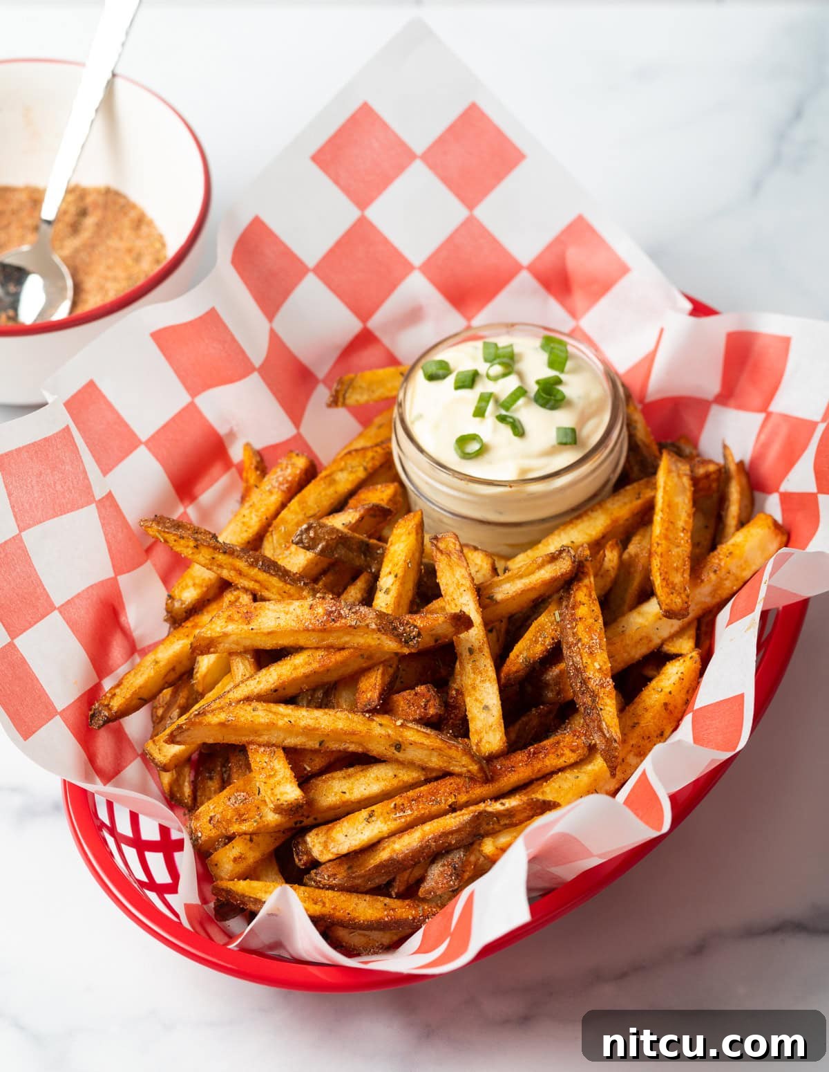 Final shot of fries made with the best Cajun fry seasoning recipe.
