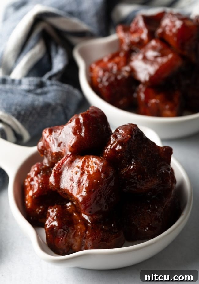 Deliciously smoked pork belly burnt ends, ready to be enjoyed.