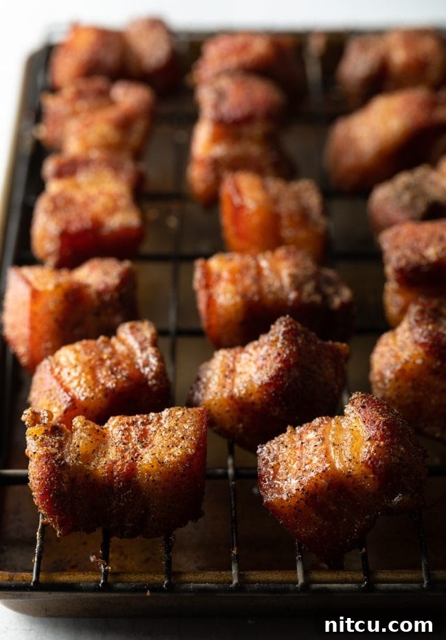 Smoked pork belly burnt ends, tender and perfectly rendered.