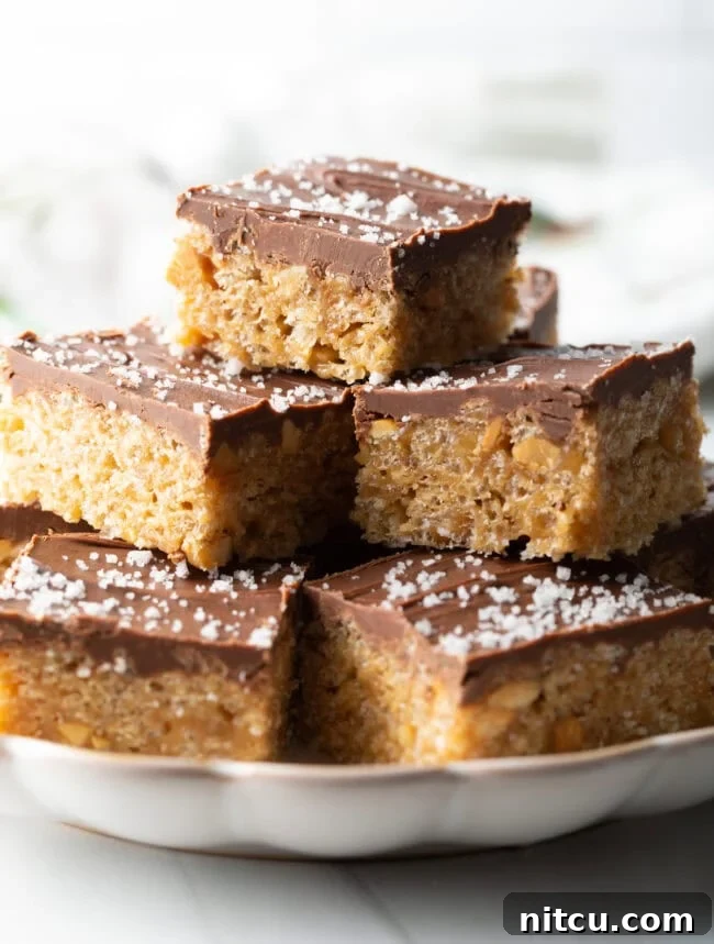 Plate of stacked Scotcharoos Peanut Butter Rice Krispie Bars