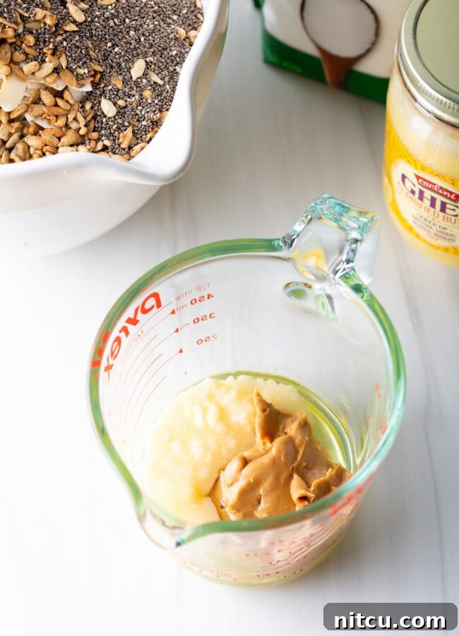 All wet ingredients mixed in a small bowl, ready to be combined with dry ingredients.