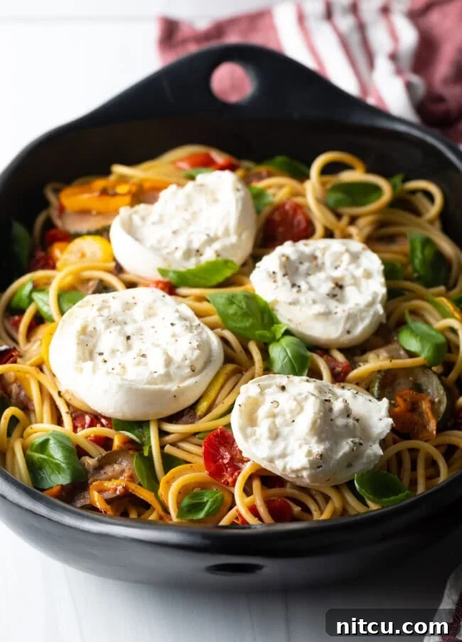 Final view of the Burrata Pasta with Roasted Vegetables dish, ready to be served.