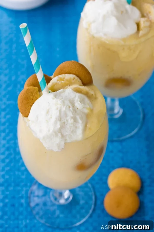 Creamy Banana Pudding Milkshake with whipped cream and vanilla wafers