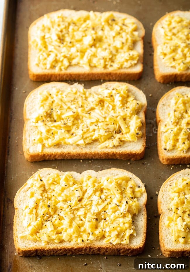 Mixing cheese and egg for toastie topping.