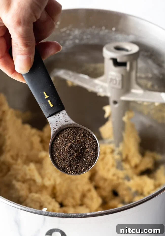 Ingredients for Earl Grey Cookies laid out on a baking surface.
