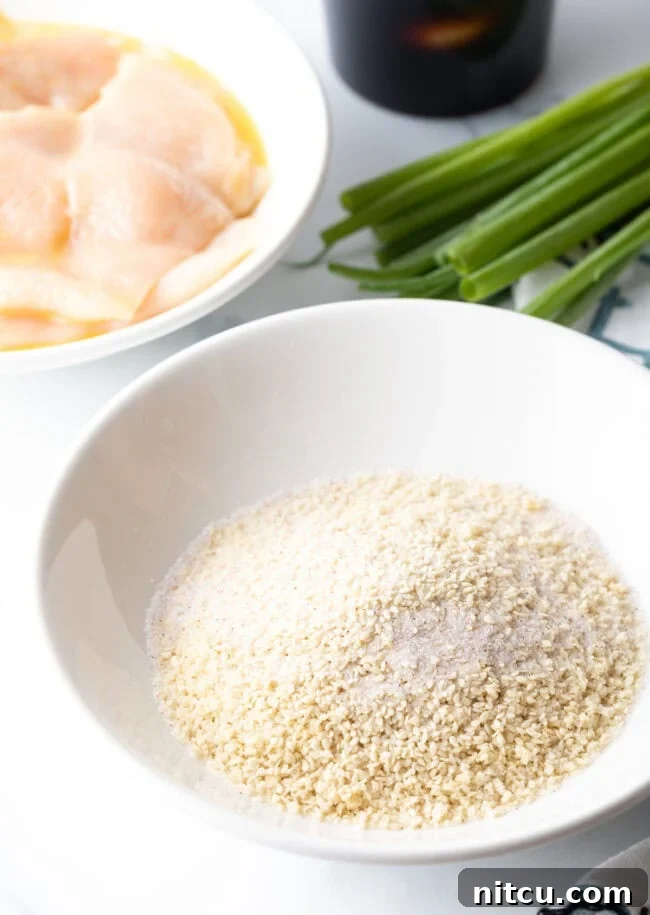 Bread crumb mixture in a white bowl.