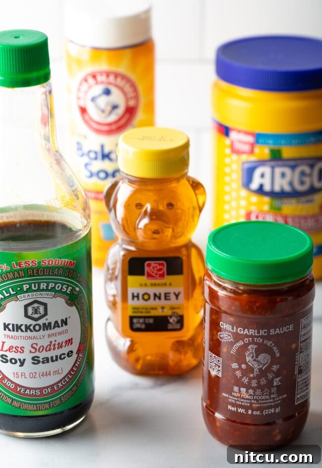 Ingredients needed for this chicken lollipop recipe: Soy sauce, chili garlic sauce, honey, baking soda and cornstarch.