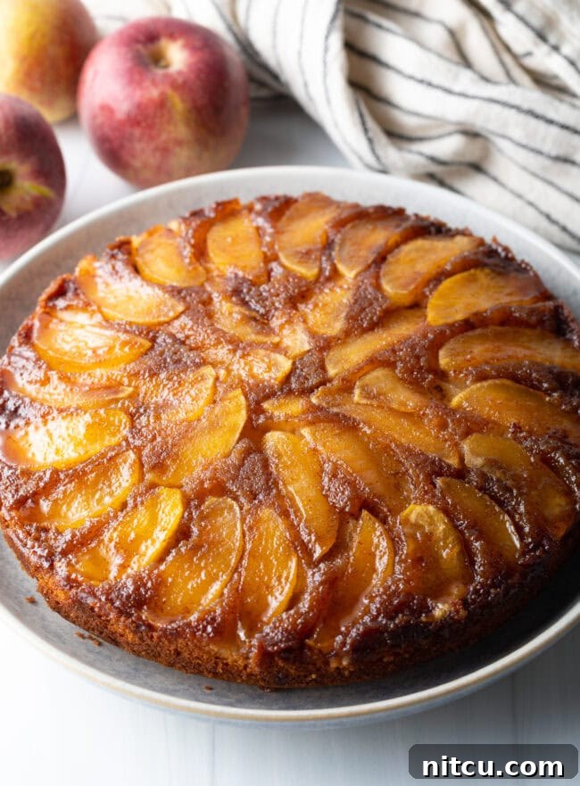 Apple upside down cake on a platter.