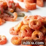 Close view of pile of Mexican chamoy candy gummy rings.