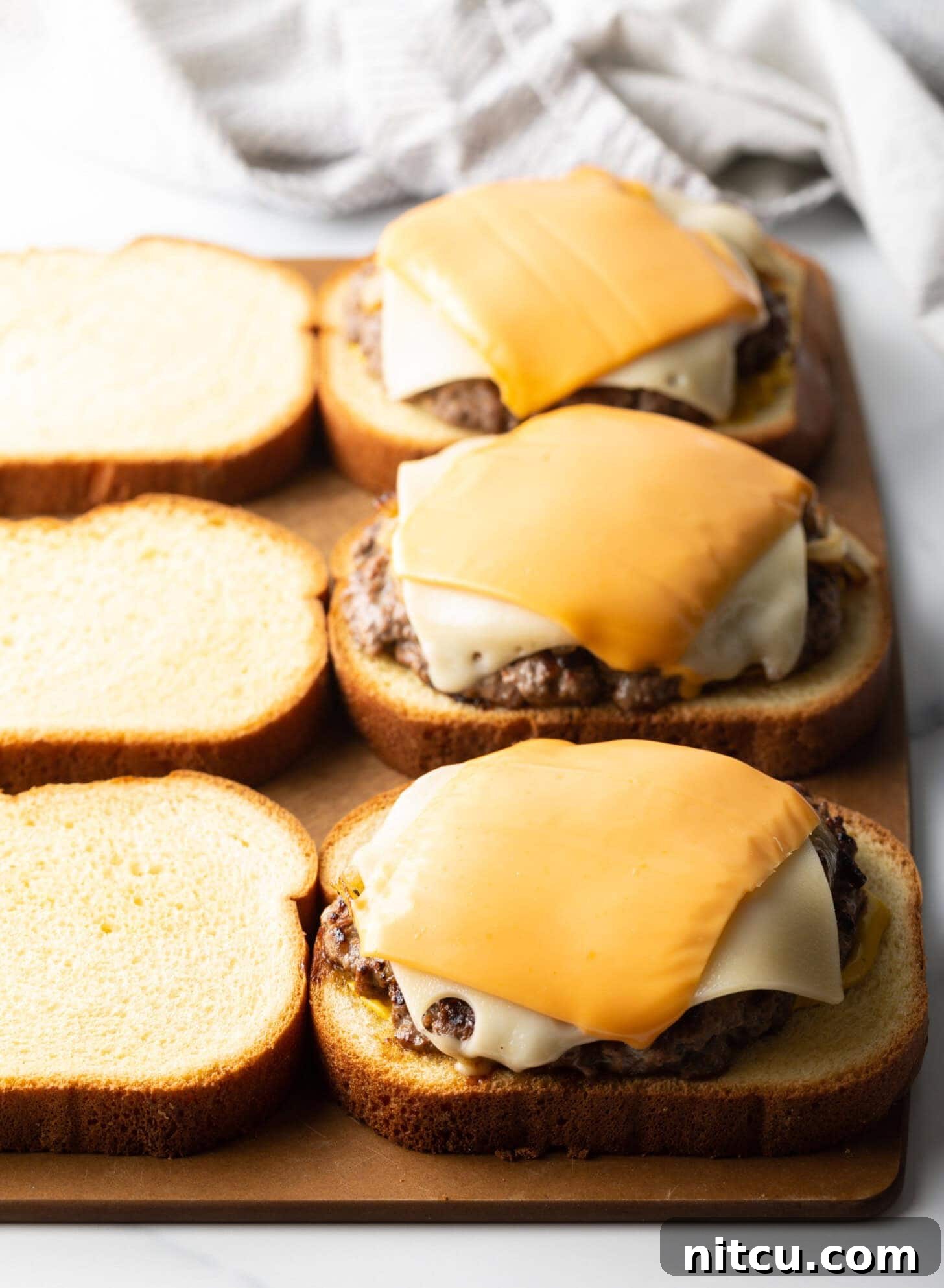 melted cheese on burgers