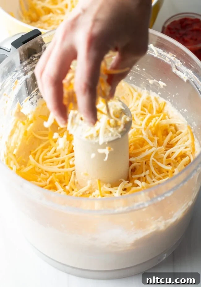 add extra cheese to the food processor
