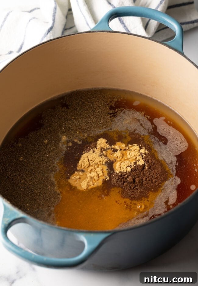 Sugar added to the cooking pot.