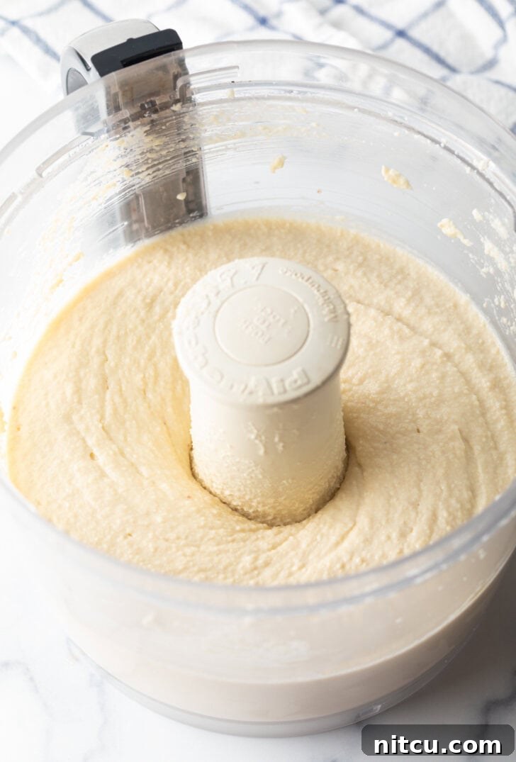 Food processor with smooth cottage cheese cookie dough.