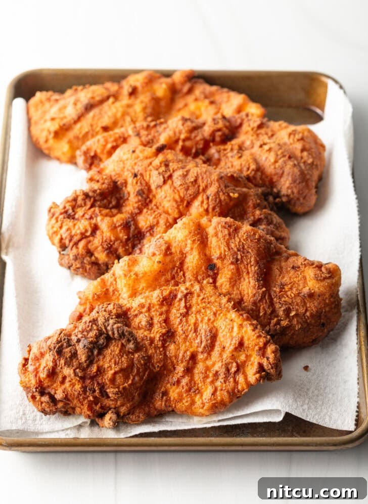 fried chicken for sandwiches on tray