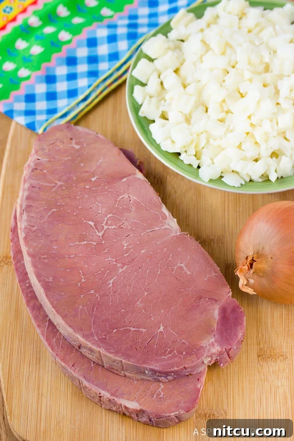 Hearty blend of beef and potatoes, the foundation of a delicious homemade corned beef hash.