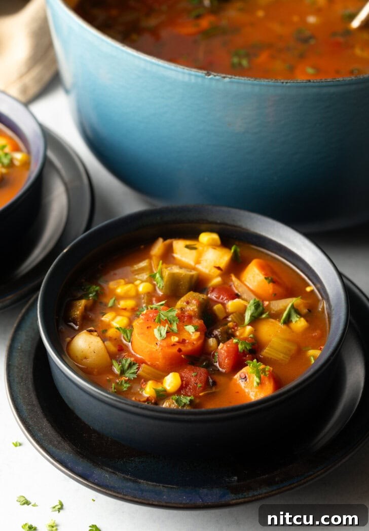 Black bowl with veggie stew.