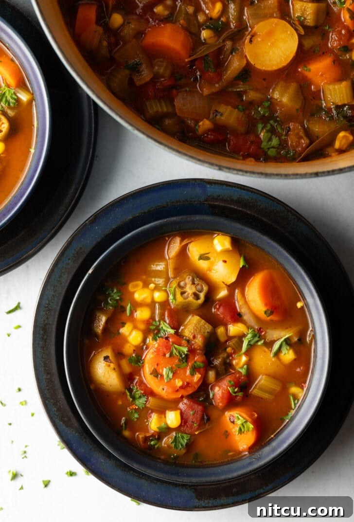 Black bowl with veggie stew.