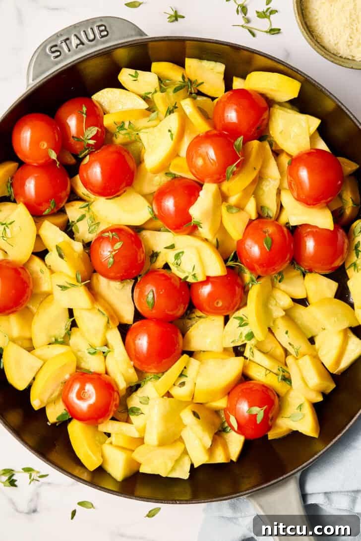 Sautéed Yellow Squash Recipe with Blistered Tomatoes in skillet