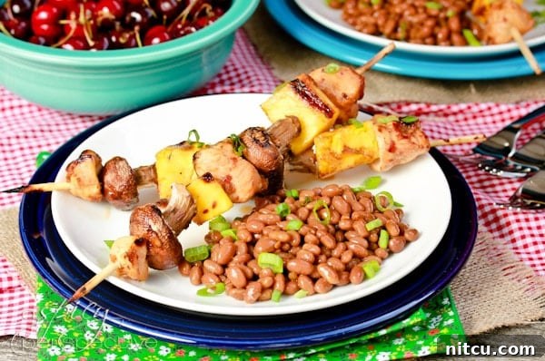 Kung Pao Chicken Skewers - Perfect for 4th of July BBQ with vibrant colors and grilled char marks