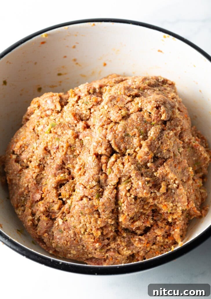 The perfectly shaped meatloaf mixture, ready for its final transformation into two loaves.