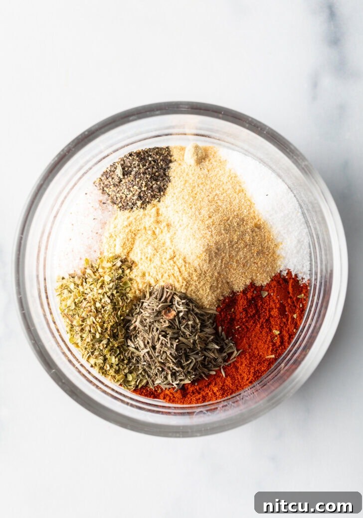 All of the blackening seasoning in a glass dish.
