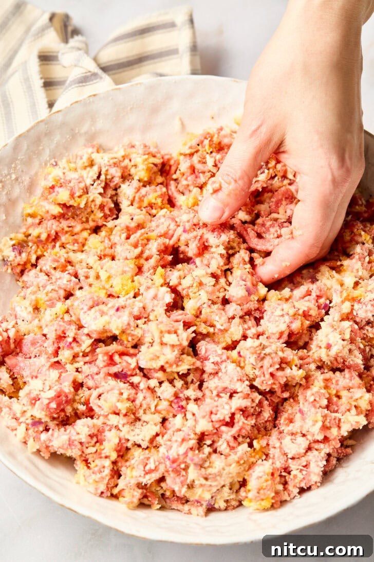 Gluten Free Meatballs - mixing meatballs