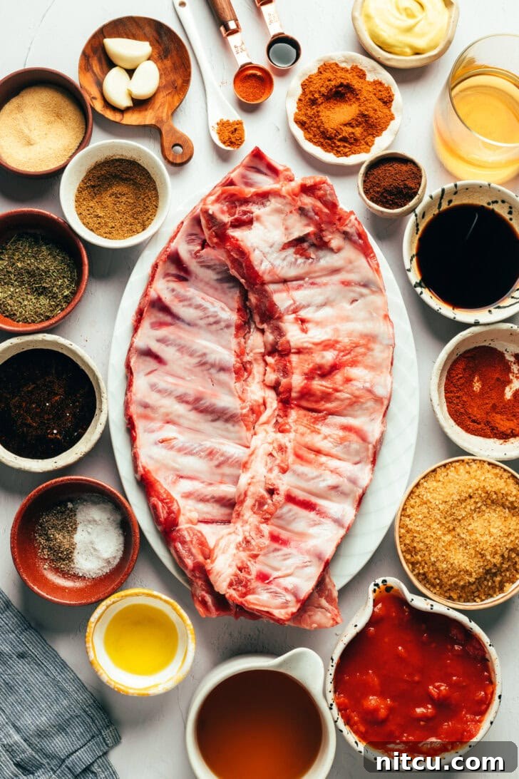 Ingredients for baby back ribs and coffee BBQ sauce arranged on a kitchen counter