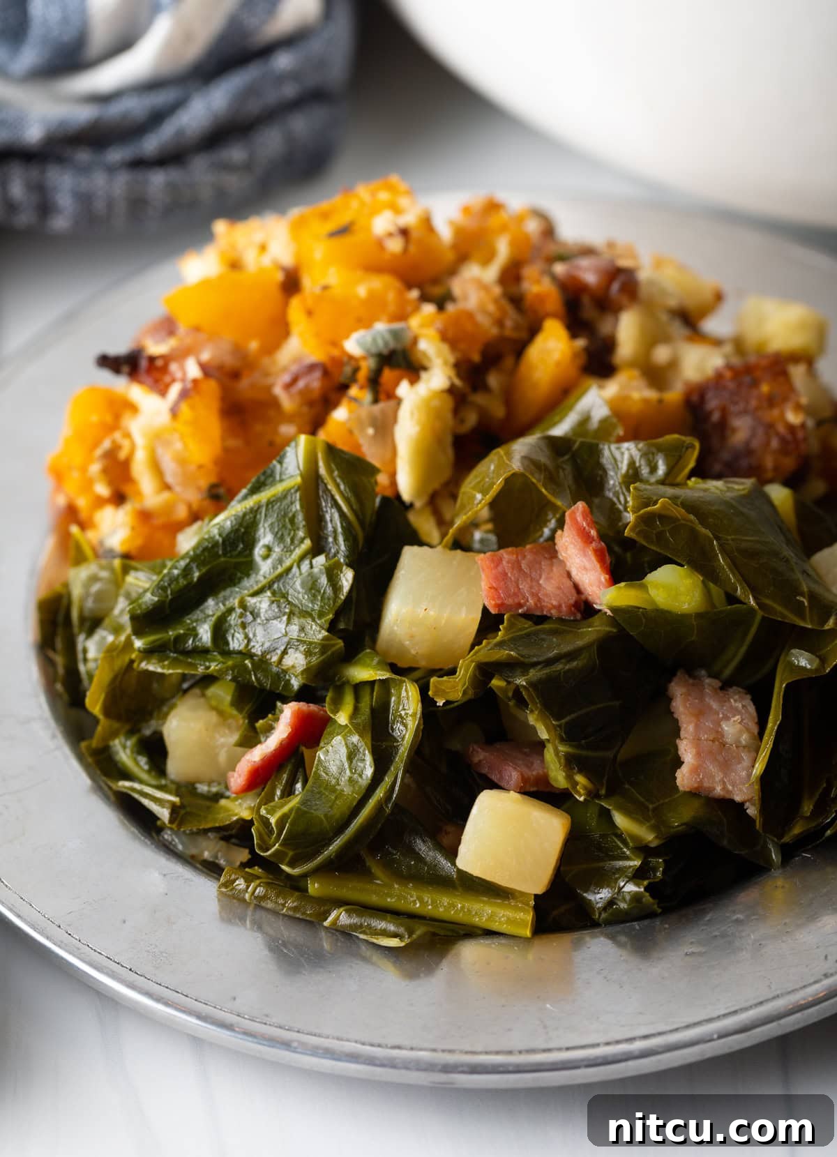 A beautifully plated dish of Southern stewed greens, garnished and ready to be enjoyed as a wholesome and traditional meal.
