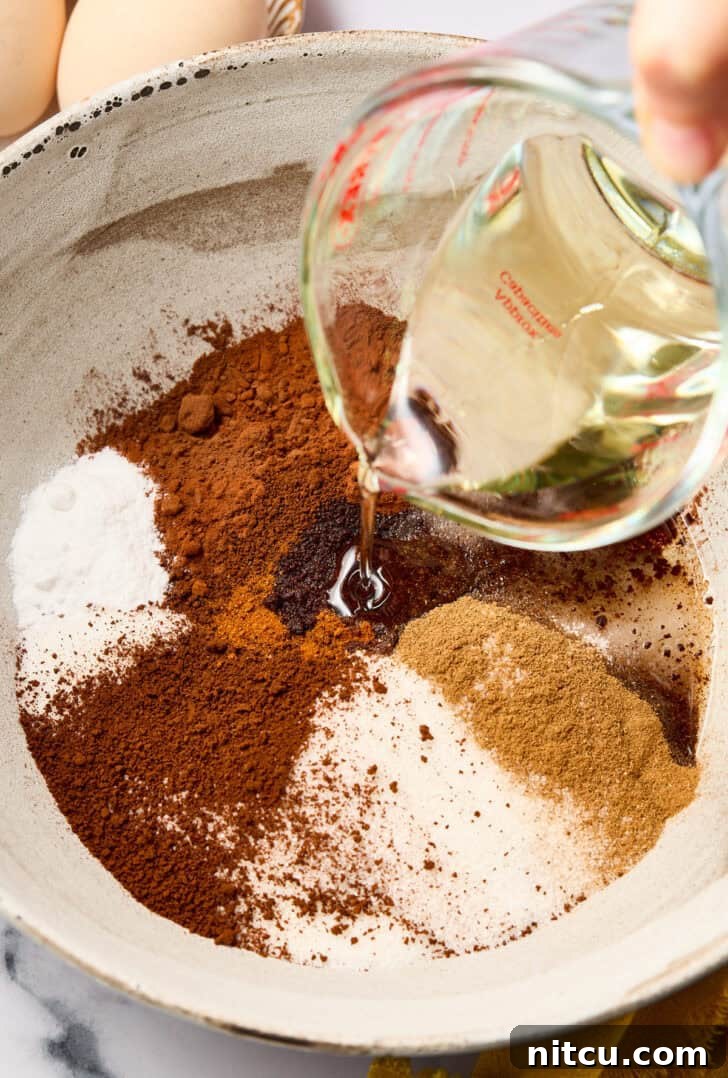 Mexican Crinkle Cookies - Dry ingredients in a mixing bowl, ready to be combined.