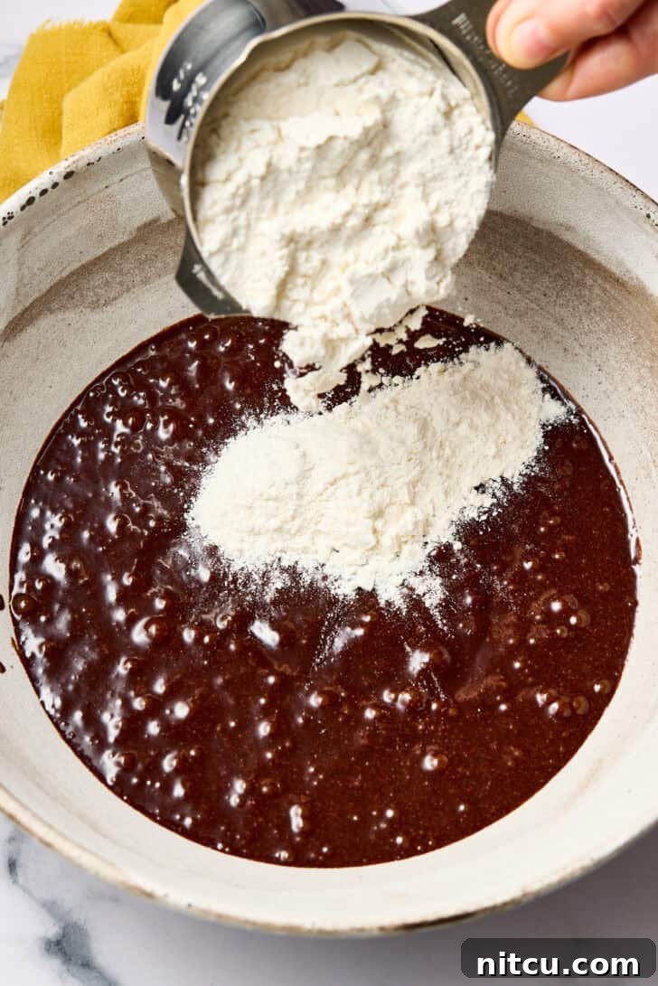 Mocha Crinkle Cookies - making cookie dough in large mixing bowl with electric mixer.