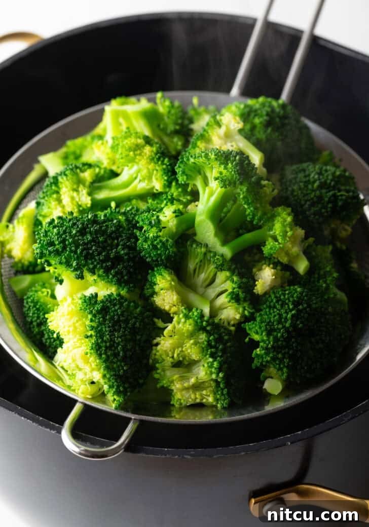 strain cooked broccoli in seive