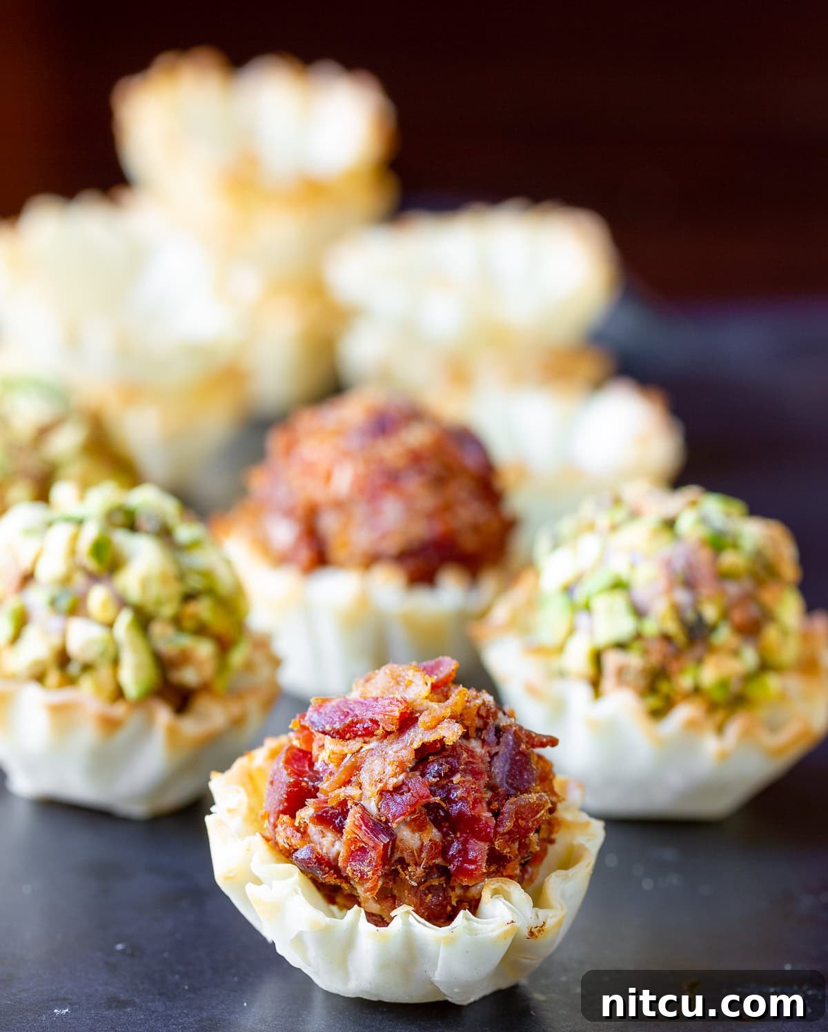 Mini cheese balls in in small fillo cups.