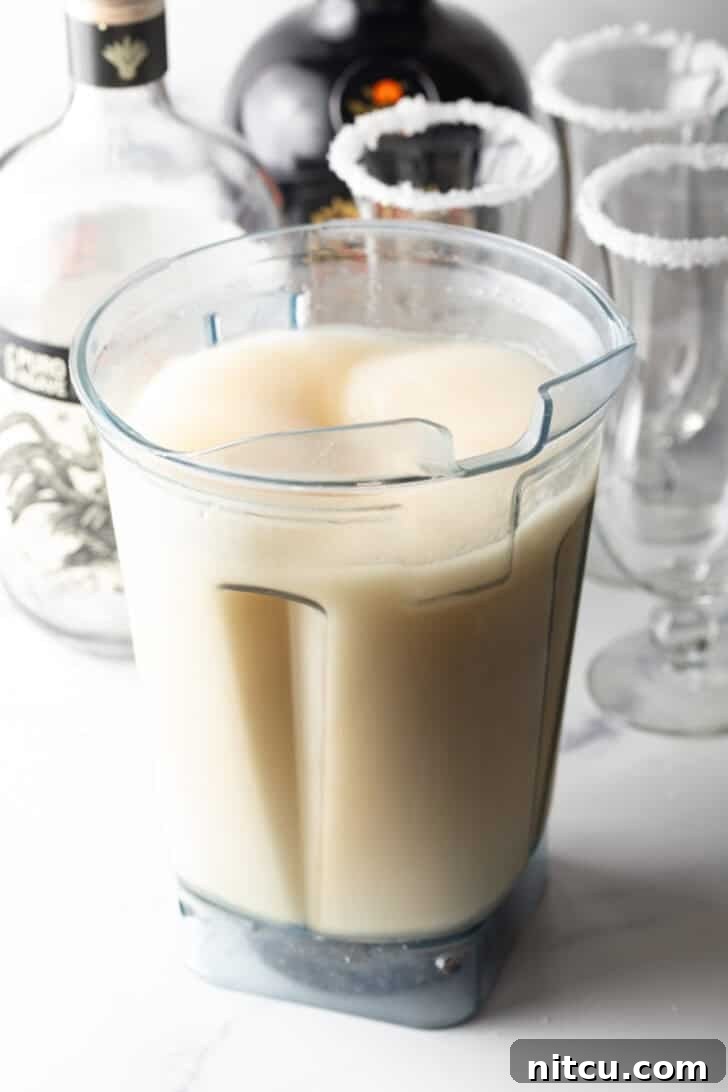 Blender filled with frozen margaritas.