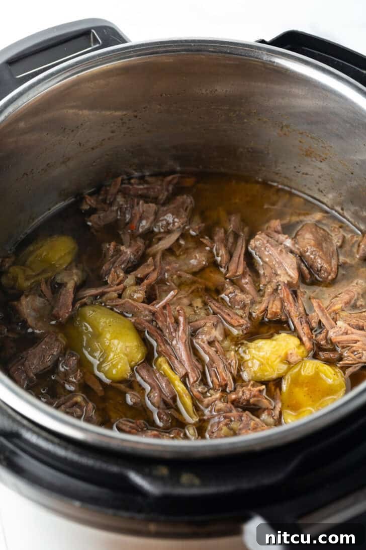 Shredded pot roast in an instant pot.
