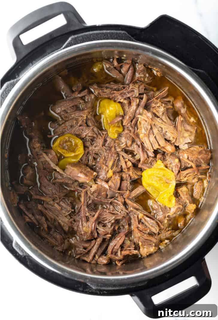 Top down shredded beef in an instant pot.