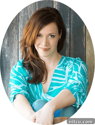 A friendly headshot of Sommer Collier, a culinary expert and recipe developer, smiling warmly.