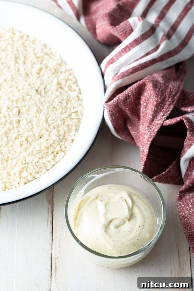 Closeup of mayonnaise in a small jar, ready for the coating mixture.